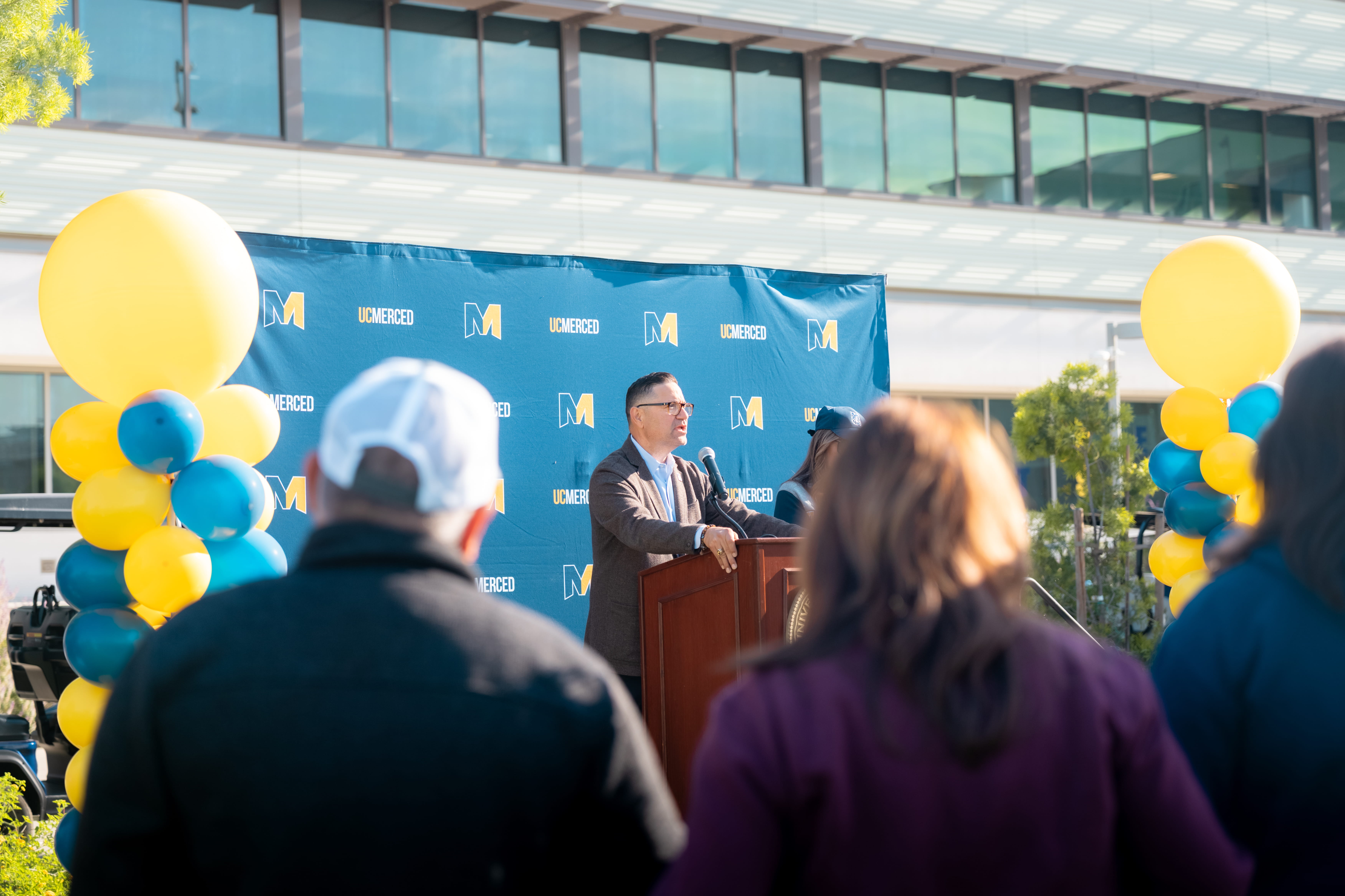 A picture of the Chancellor giving a speech at the 2026 UC Merced Bobcat Day